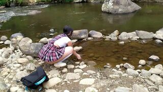Horny schoolgirl skips classes to get fucked in a river